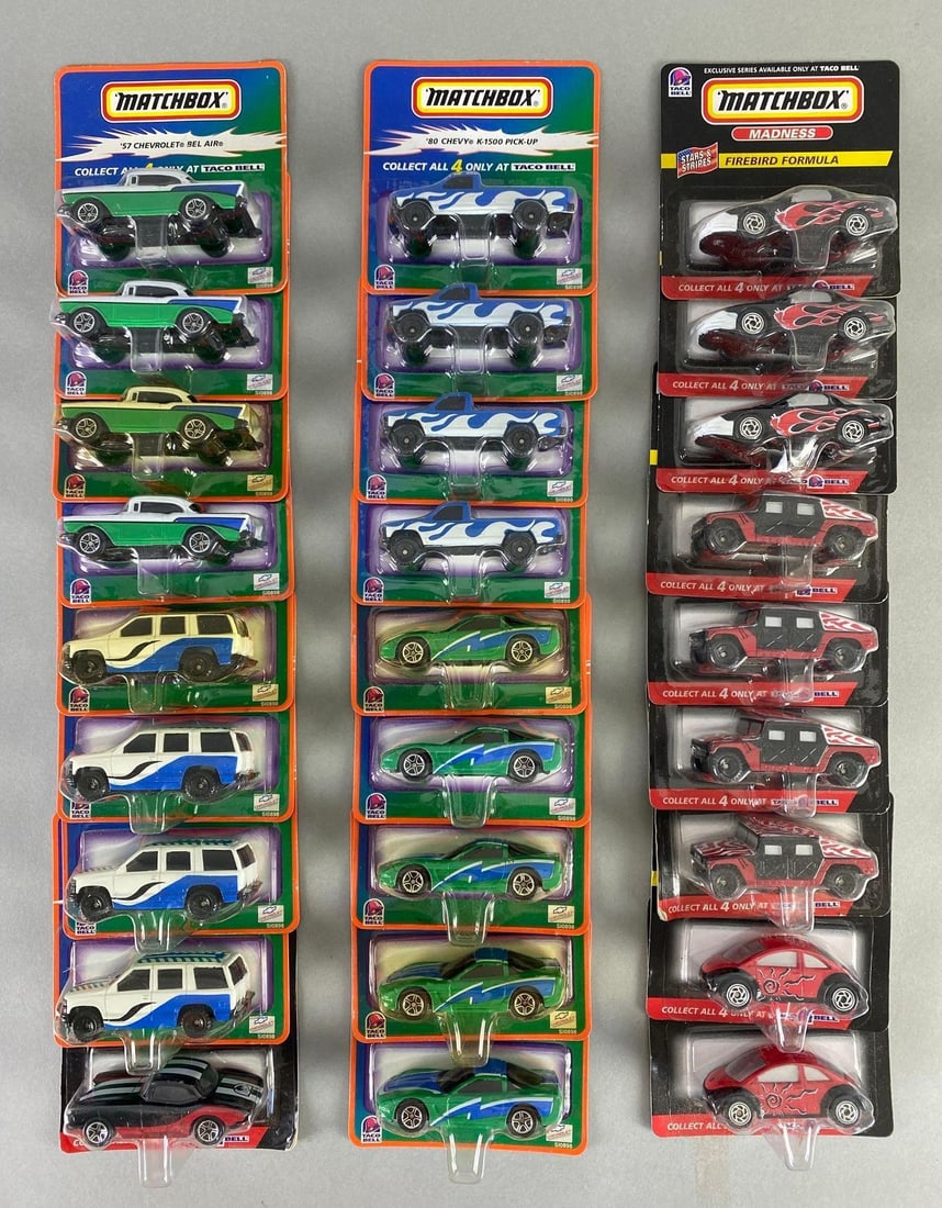 Group of Matchbox Taco Bell Promotional Die-Cast Vehicles: Includes Firebird Formula, Humvee, 97 Chevy Tahoe, and more, All in original packaging, Packaging measures 4 x 4 x 1 1/2 inches.