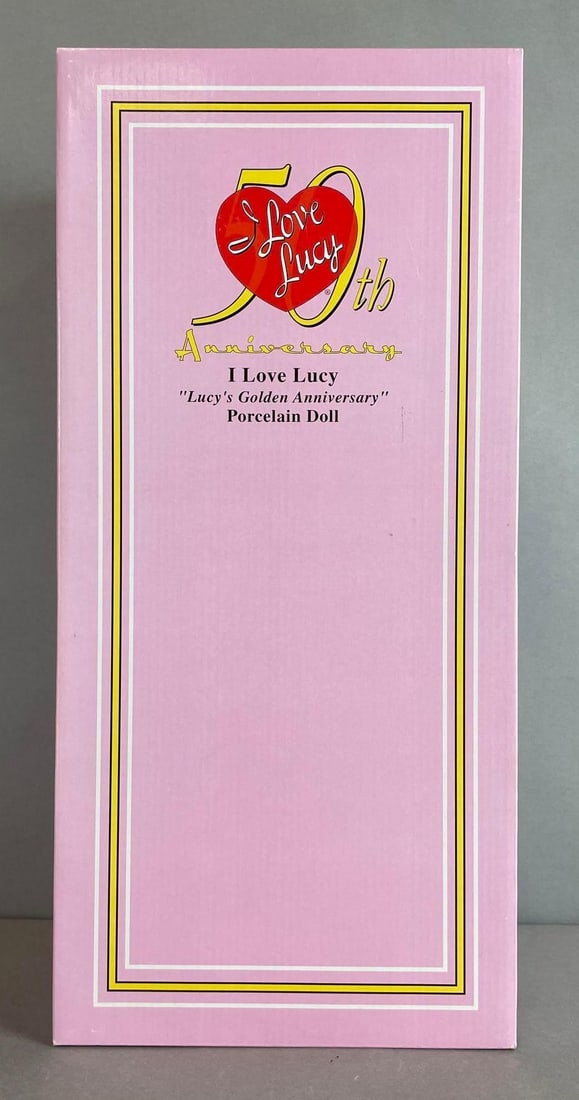 50th Anniversary I Love Lucy Porcelain Doll: Lucy's golden anniversary, includes COA, and stand, and more, like new in original packaging. Measures 16 inches tall