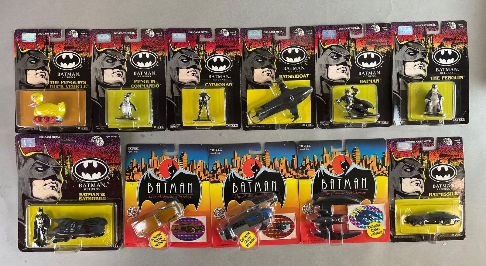 Group of Ertl Batman Returns Die-Cast Vehicles and Figures: Early 1990s. Includes the animated series, penguins duck vehicle, Batmobile, and more
