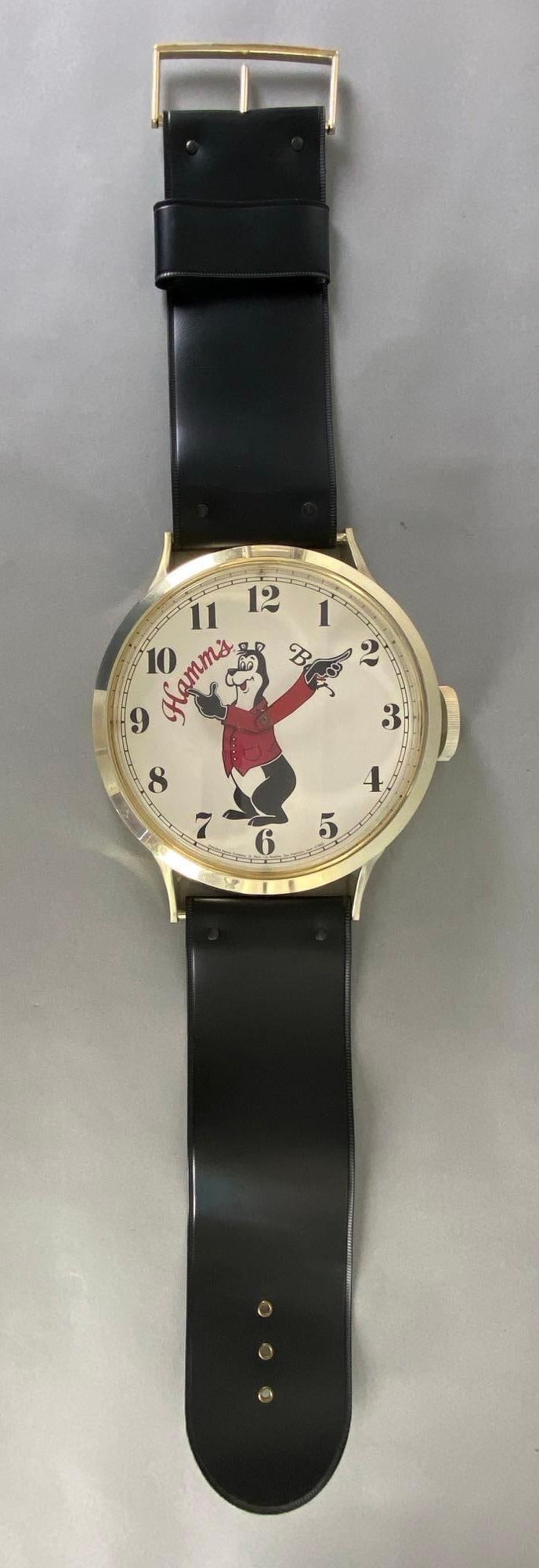 Hamms Bear Oversized Wristwatch Advertising Beer Wall Clock: In working condition, Measures 37 x 10 x 2 3/4 inches.