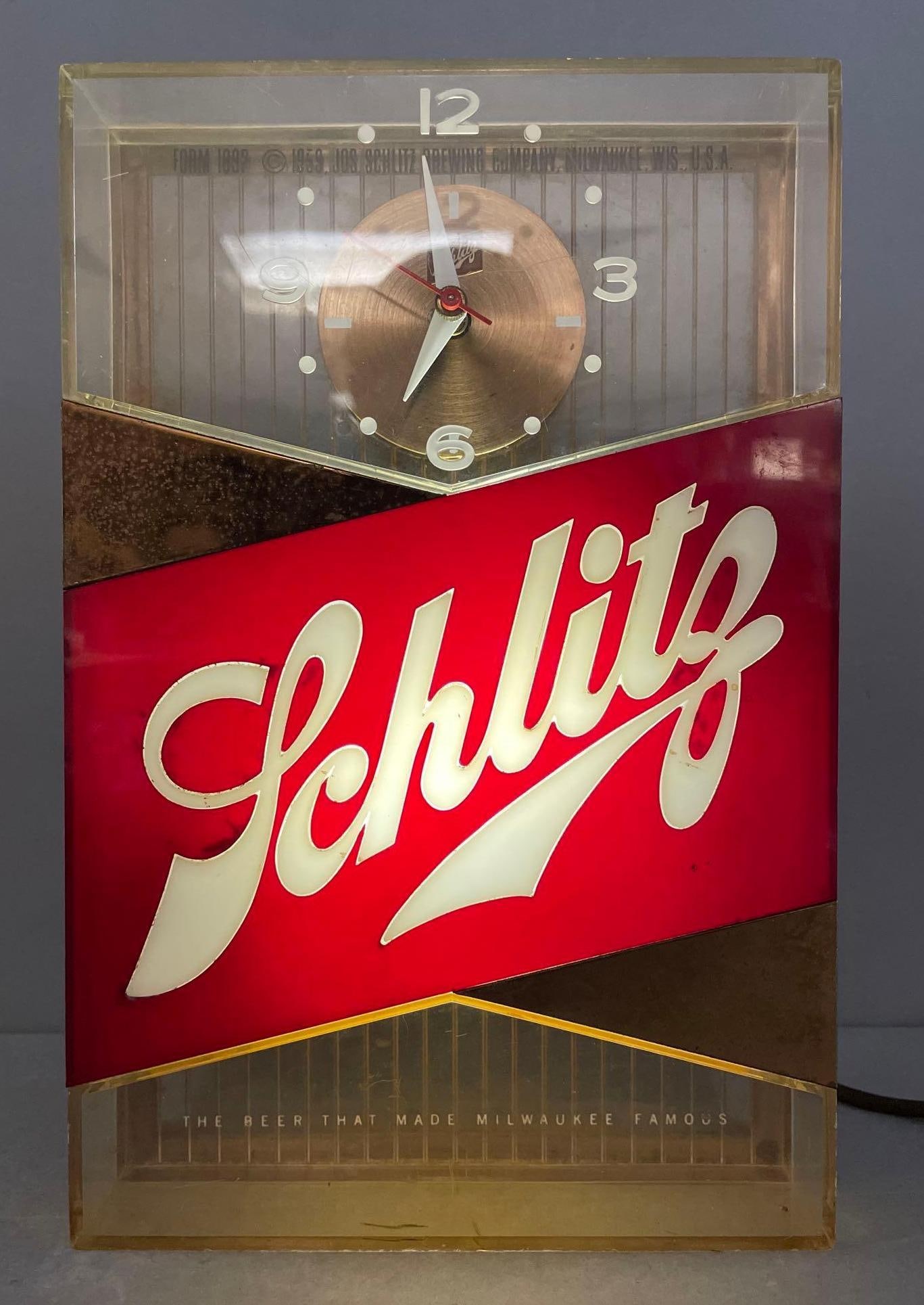 1959 Schlitz Beer Light-Up Advertising Register Topper Clock: Working condition, measures 11 x 7 x 5 1/2 inches