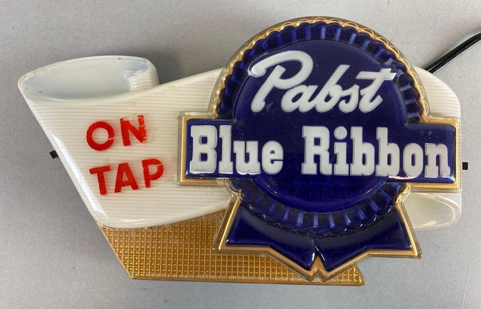 Pabst Light Up Advertising Beer Sign: Works. Measures 6 3/4 x 11 1/2 x 1 3/4 inches.