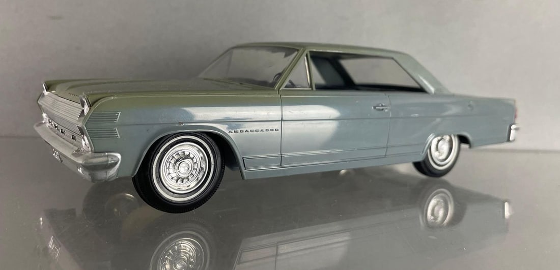 1966 AMC Ambassador Solid Blue Friction Dealership Promo Car: Working condition, discoloration on top, dark gray interior, 1/25 scale