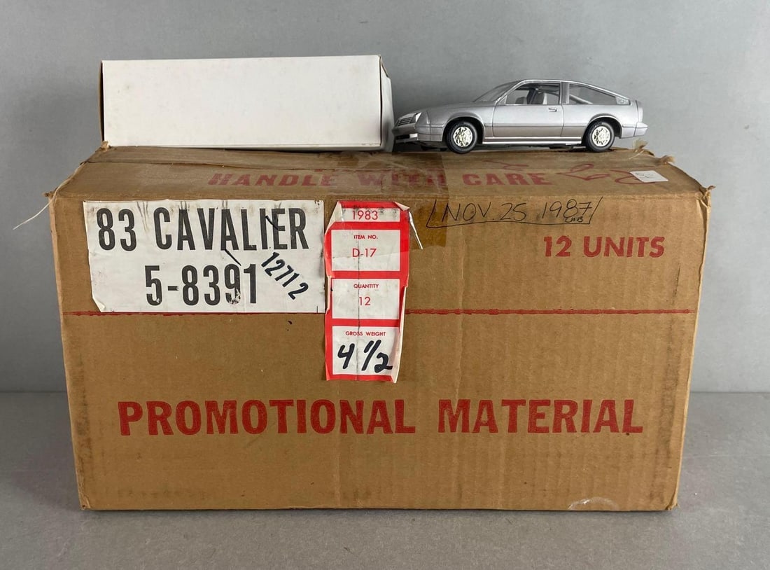 Shipping Box of 11 AMT Ertl 1983 Chevy Cavalier Silver Metallic Promo Cars: 1/25 scale, original packaging