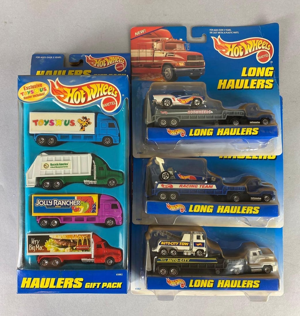 Group of Mattel Hot Wheels Die-Cast Haulers: like new in original packaging, includes branded gift pack