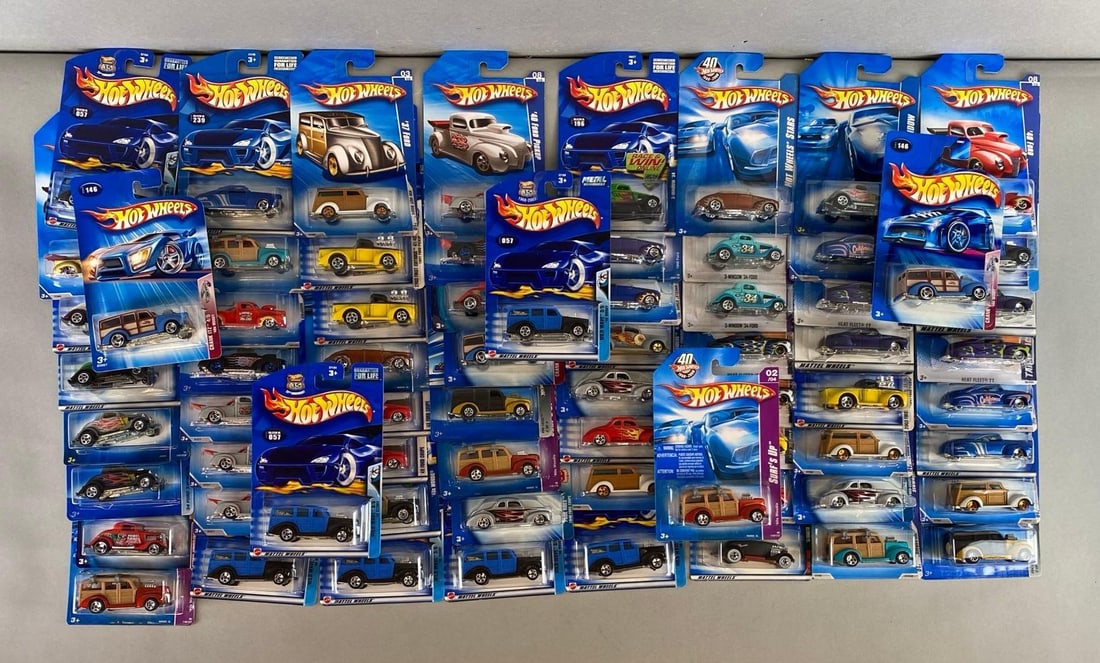 Group of 60+ Mattel Hot Wheels Street Rods Die-Cast Cars: Like new in original packaging. Includes ‘40 Woody, ‘33 Roadster, ‘41 Ford Pickup and more.