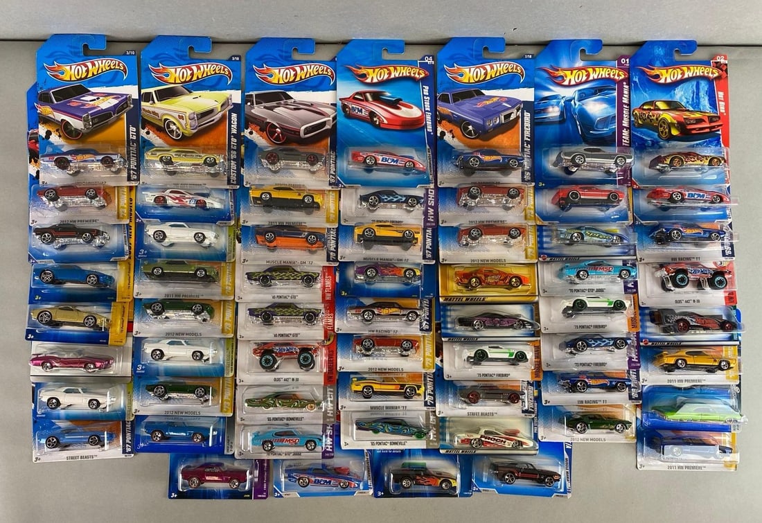 Group of 50+ Mattel Hot Wheels Muscle Die-Cast Cars: Like new in original packaging. Includes Pontiac Bonneville, Pontiac GTO, Pontiac Firebird and more.