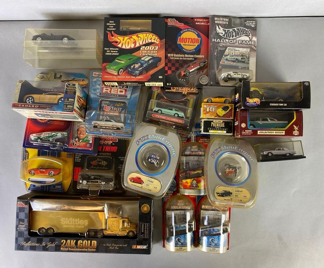 Group of Assorted Die-Cast Vehicles: Includes Semi Truck, mini engine, funny cars and more, most are 1 / 64 scale