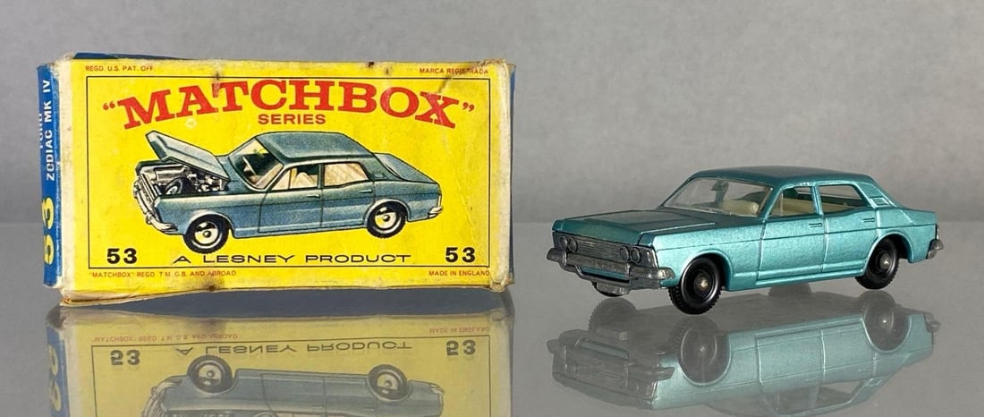 Matchbox No. 53 Ford Zodiac MK IV: With box, A Lesney Product, Made in England, Color: Metallic Blue, Silver base, Black plastic wheels, Die-Cast, Some tears in box.