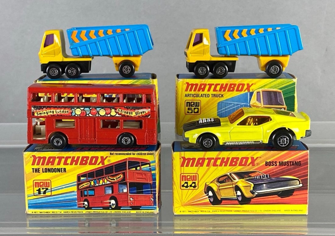 Group of 4 Matchbox Die-Cast Vehicles: With boxes, Includes No. 17 The Londoner, No. 44 Boss Mustang, and (2) No. 50 Articulated Truck.