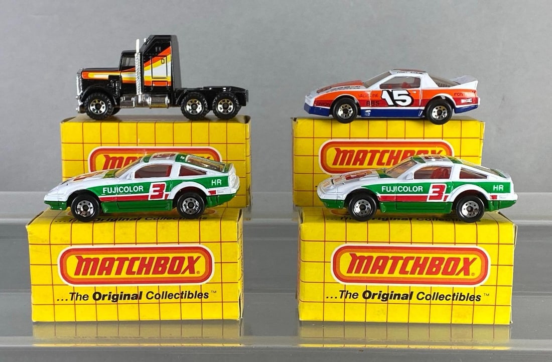 Group of 4 Matchbox Die-Cast Vehicles: With boxes, Includes (2) No. 24 Nissan 300ZX Turbo, (1) No. 41 Kenworth Conv. Aerodyne, and (1) No. 60 Pontiac Firebird Racer.