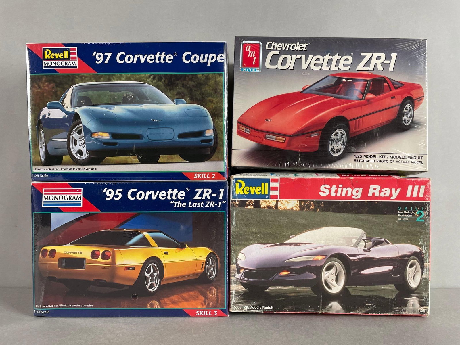 Group of Chevy Corvette Model Kits: Includes monogram , amt Ertl , open revell sting ray III, 1/25 scale