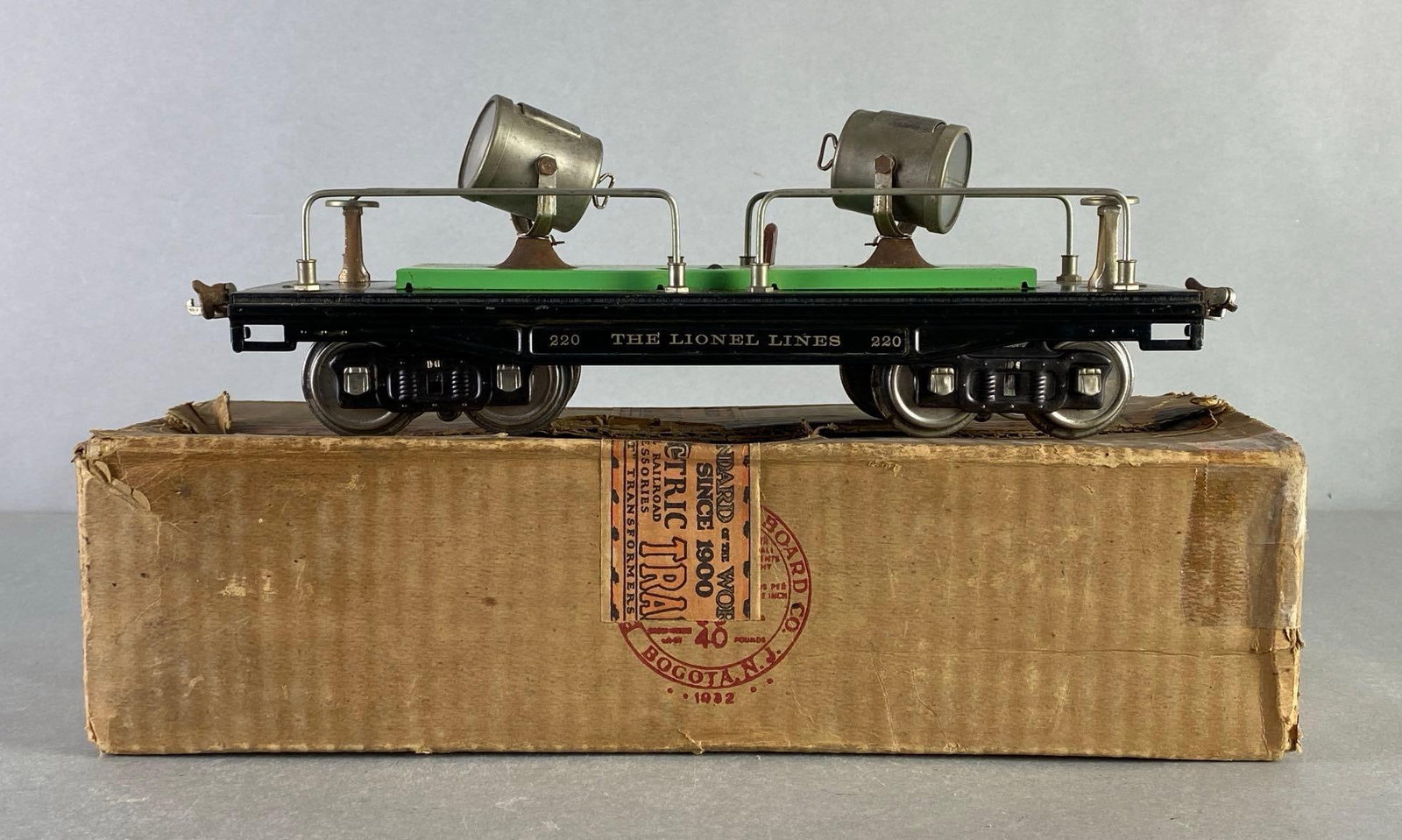 Pre-War Lionel Lines S Scale No. 220 Spotlight Car: With original box, Untested, Train car measures 12 1/2 inches long.