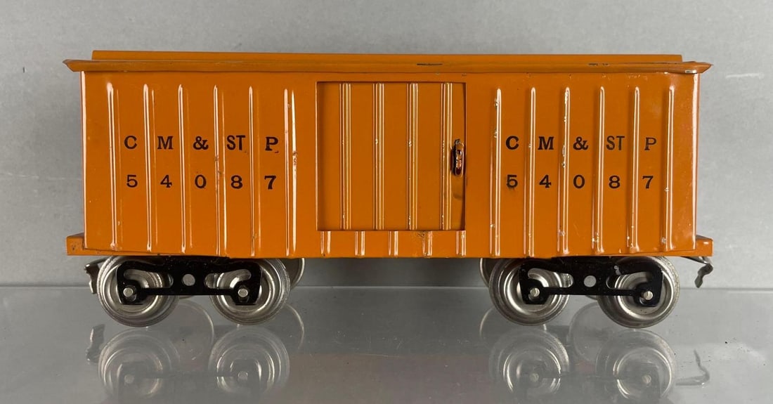 Lionel S Scale No. 54087 Train Boxcar: CM and St P, orange