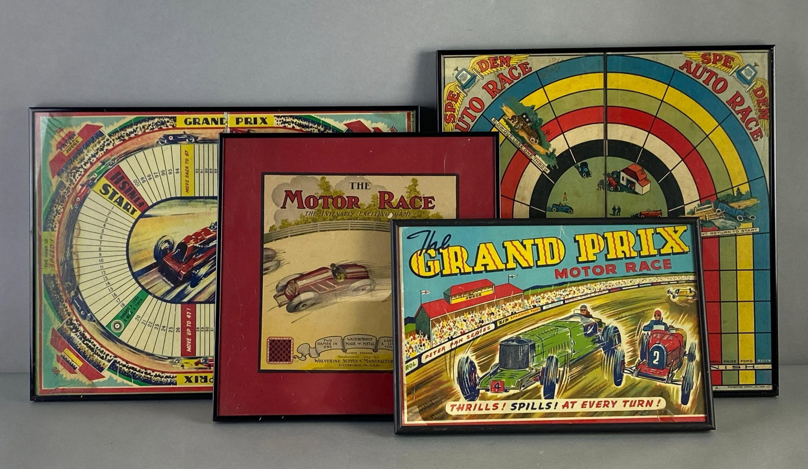 Group of 4 Framed Vintage Racing Board Game Boards and Box Art: Includes The Motor race, The Grand Prix Motor Race, SPEDEM auto race and Grand Prix, largest measures 20 x 15 inches