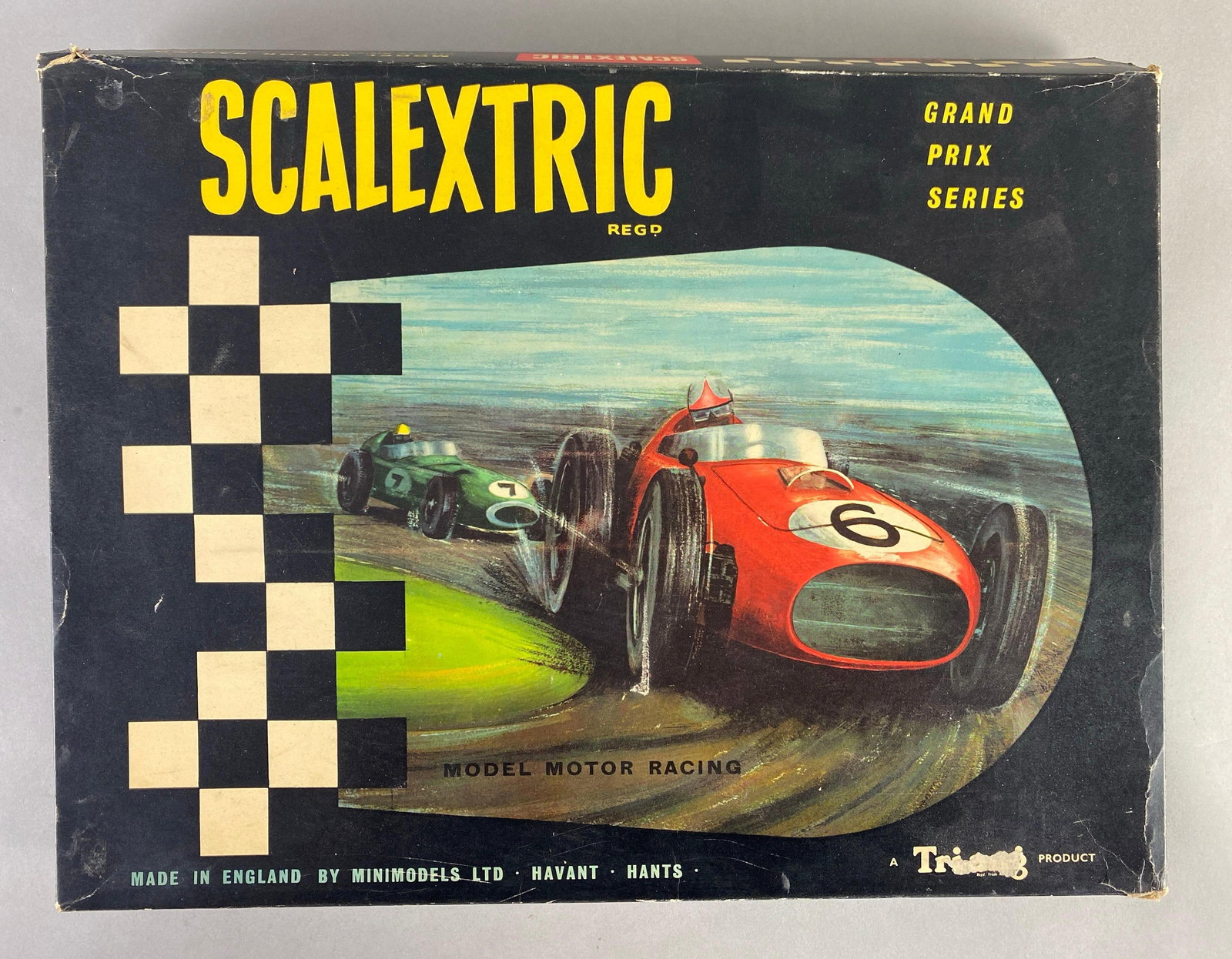 Tri-Ang Scalextric Model Motor Slot Car Racing Grand Prix Series Track with Cars: unknown set completion, tears throughout box, measures 20 1/2 x 15 1/2 x 3 inches