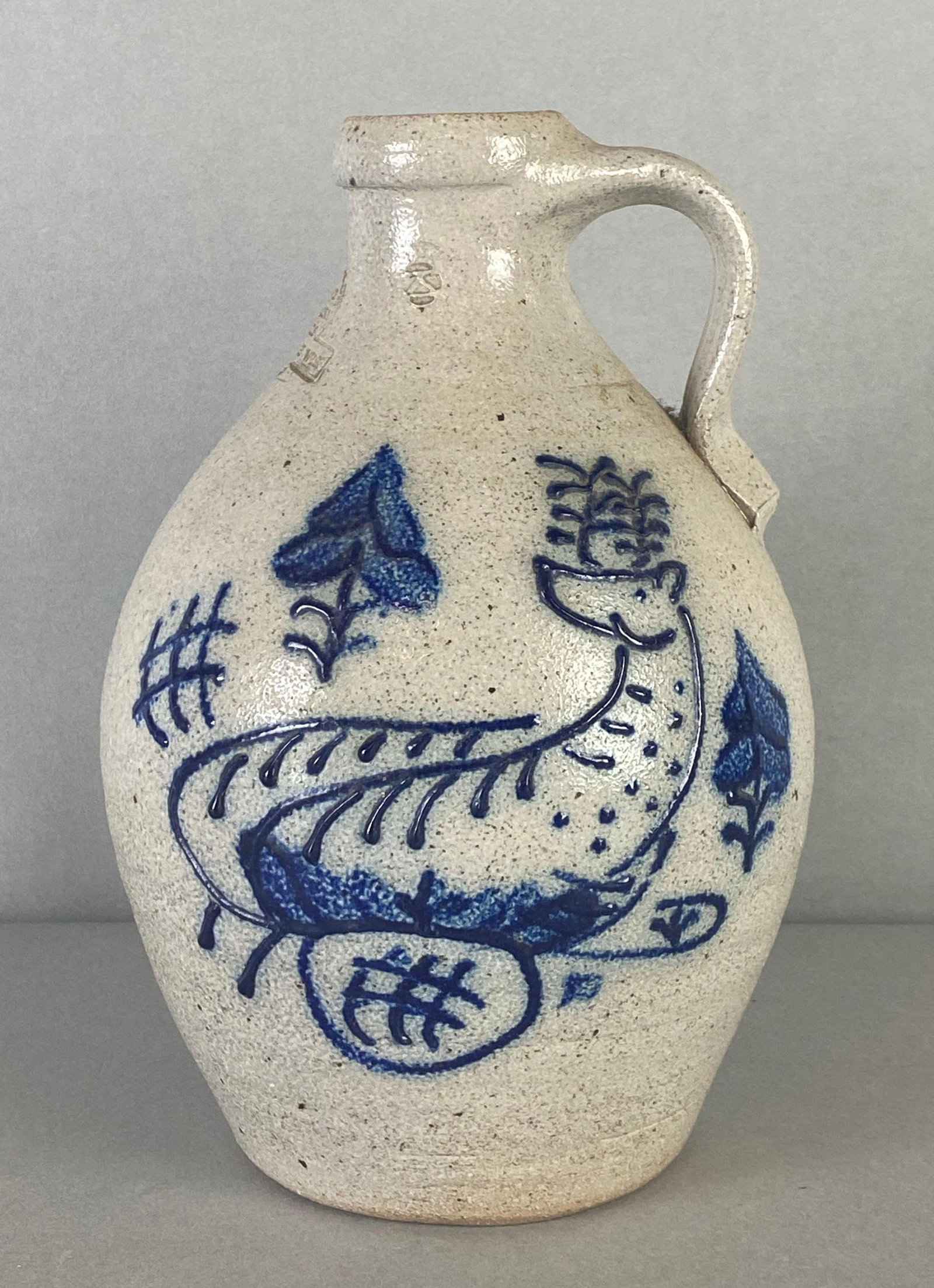 1986 Rowe Pottery Salt Glaze Stoneware Jug with Cobalt Motif: marked near neck, measures 8 1/4 x 5 1/4 x 5 1/4 inches