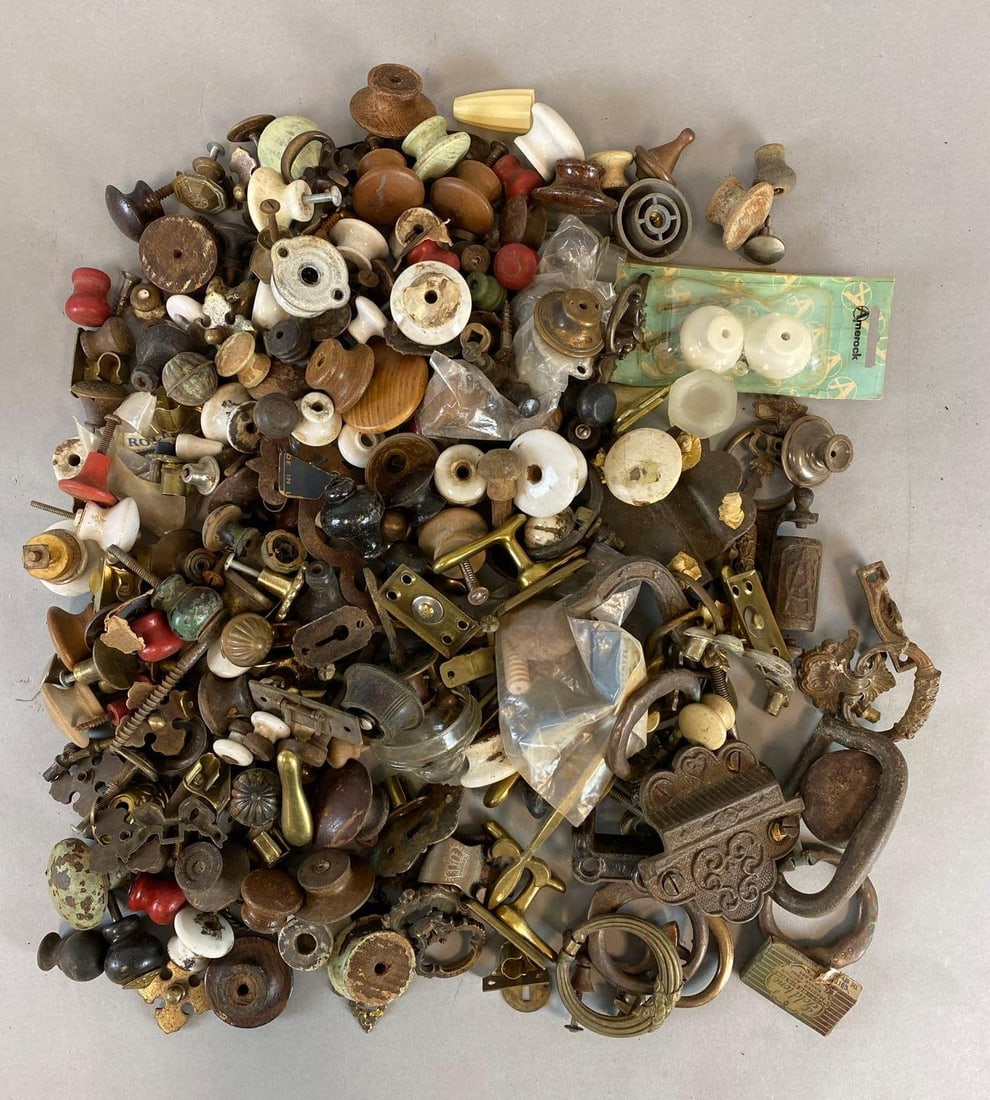 Group of Vintage Assorted Handles and More: Includes knobs, curtain hanger clips, locking handles and more. Largest item measures 3 1/2 x 3 1/2x 1 inches.