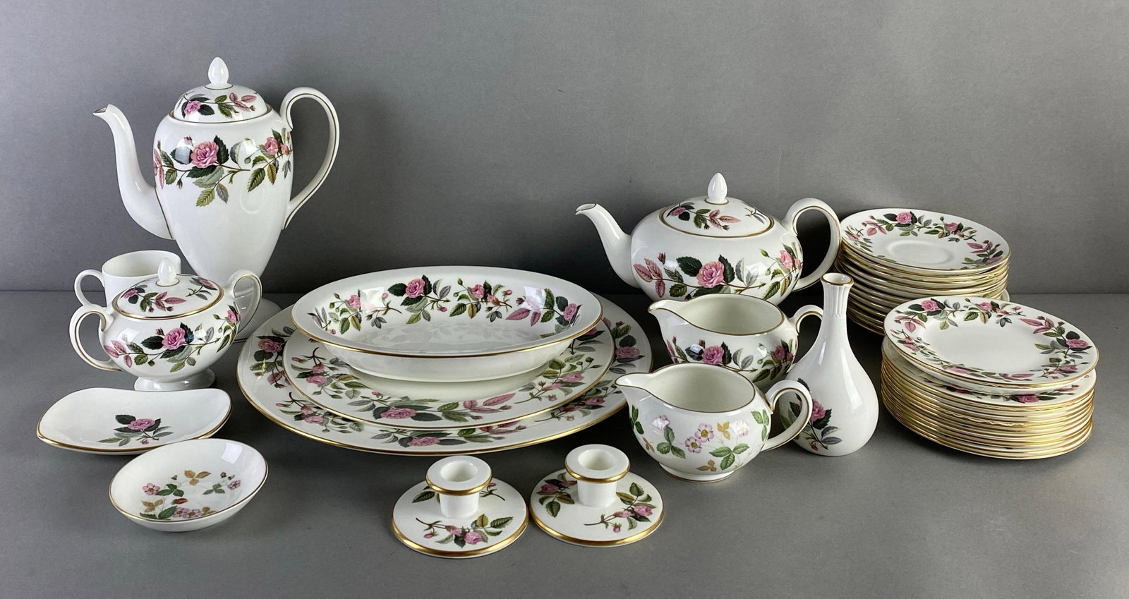 Group of Wedgwood Hathaway Rose Pattern Porcelain Dinnerware: Includes saucers, lidded mugs, teapot and more, largest plate measures 14 inches in diameter