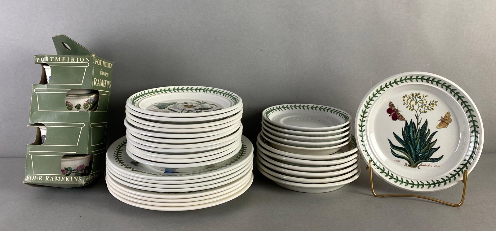 Group of 20+ Portmeirion Botanic Garden Series Porcelain Dinnerware: Made in England, 1972, includes salad plates, dinner plates, saucers and more, largest plate measures 9 inches in diameter
