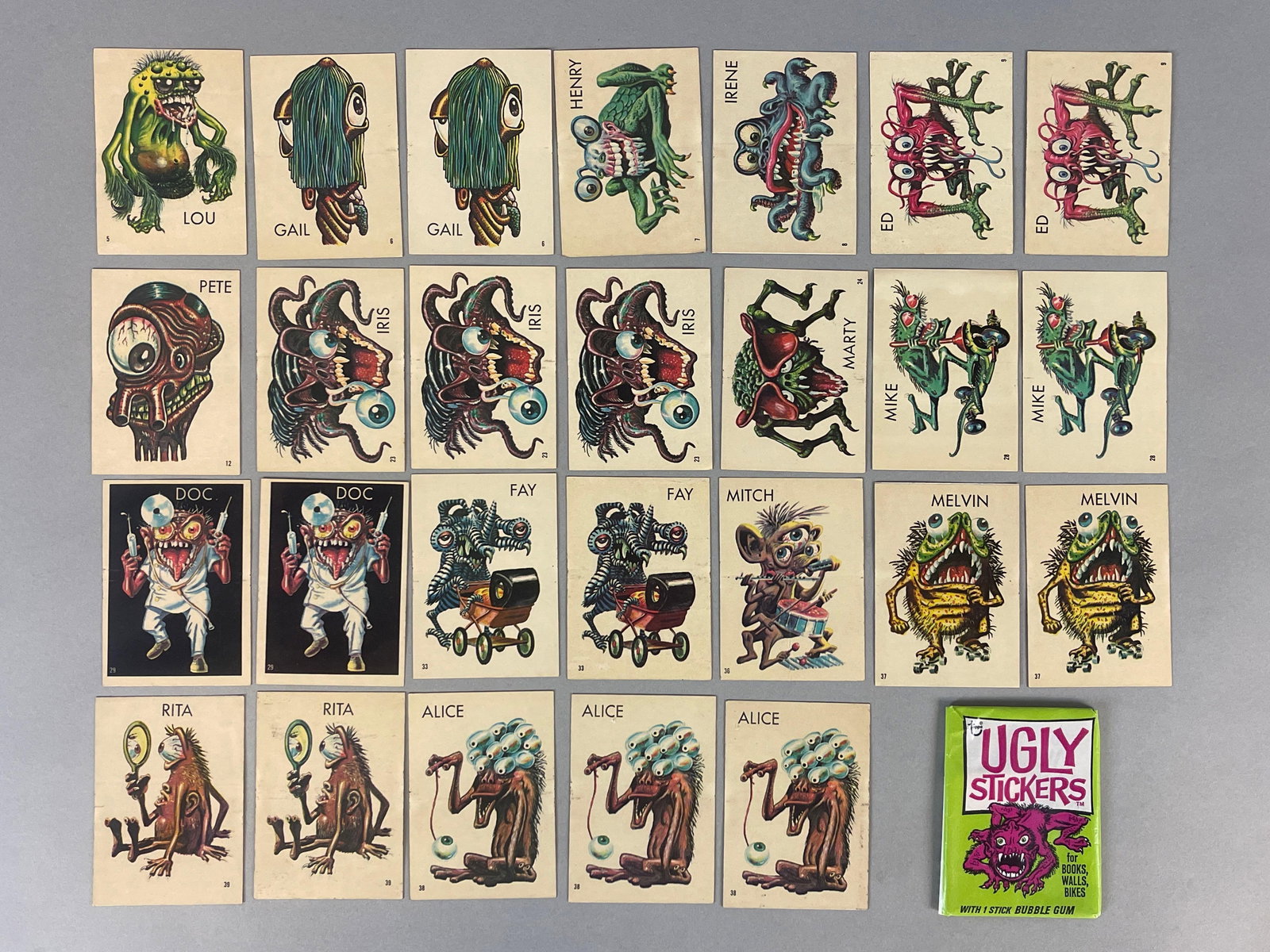 26 -1965 Topps Ugly Mosters Stickers + 1973 Topps Ugly Stickers Pack (1 of 2)