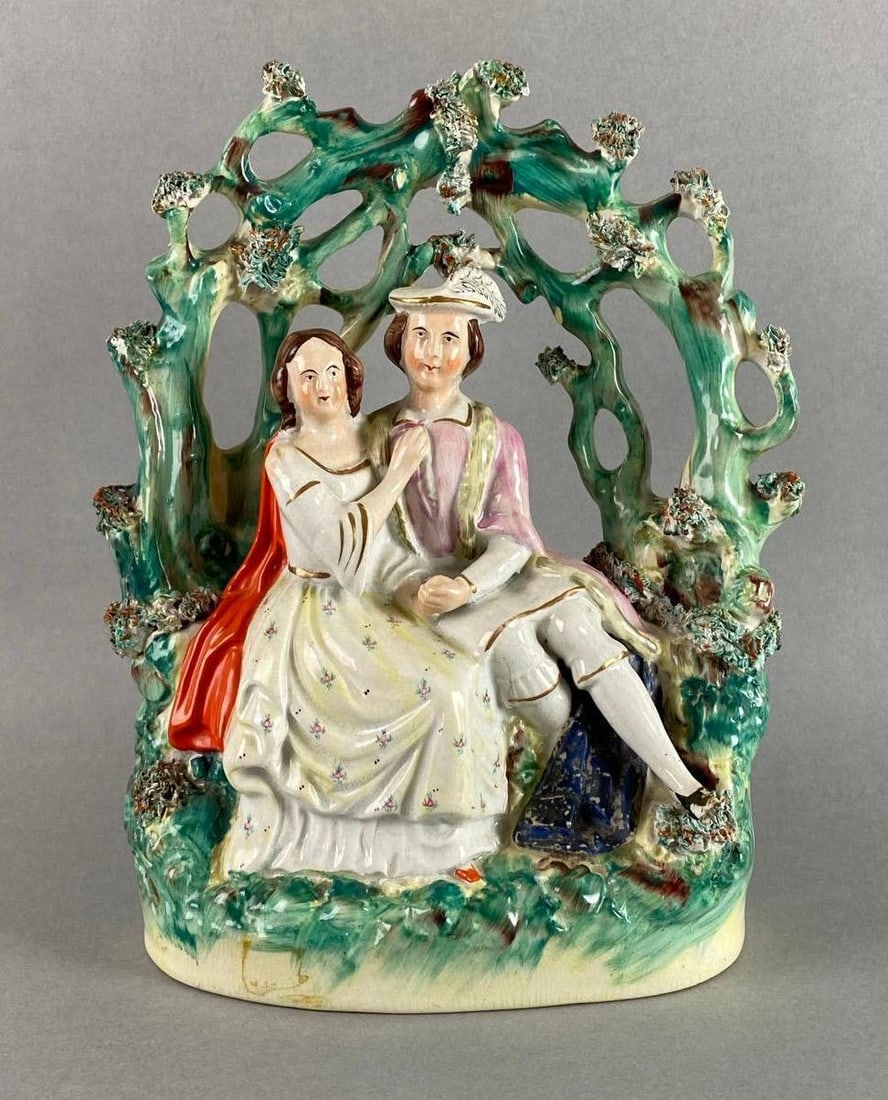 Staffordshire Romeo and Juliet Ceramic Figurine: Has chip. Measures 9 1/4 x 8 x 4 inches.