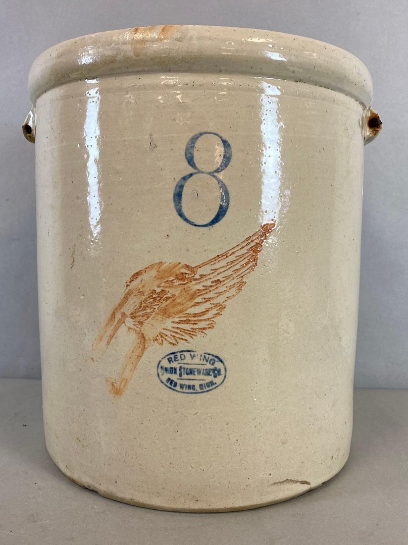 Antique 8 Gallon Red Wing Union Stoneware Co. Large Wing Crock: Has a large red Wing that is streaked, missing handles. Measures 15 1/2 x 14 inches.
