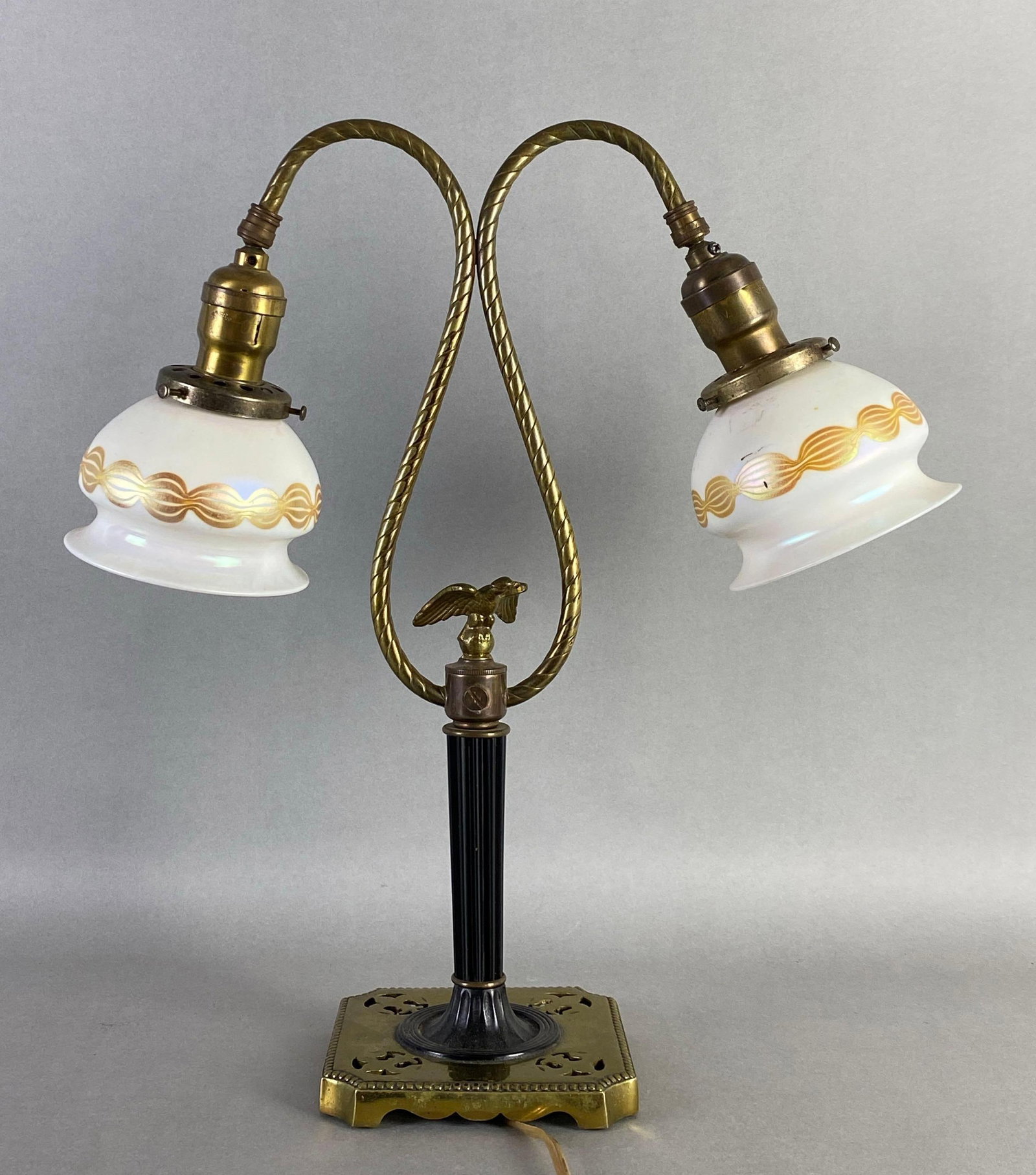 Antique Brass Dual Light Table Lamp with Loetz Gold Chain Iridescent Shades: Circa 1910s, I’m working condition, measures 17 x 16 x 5 1/2 inches