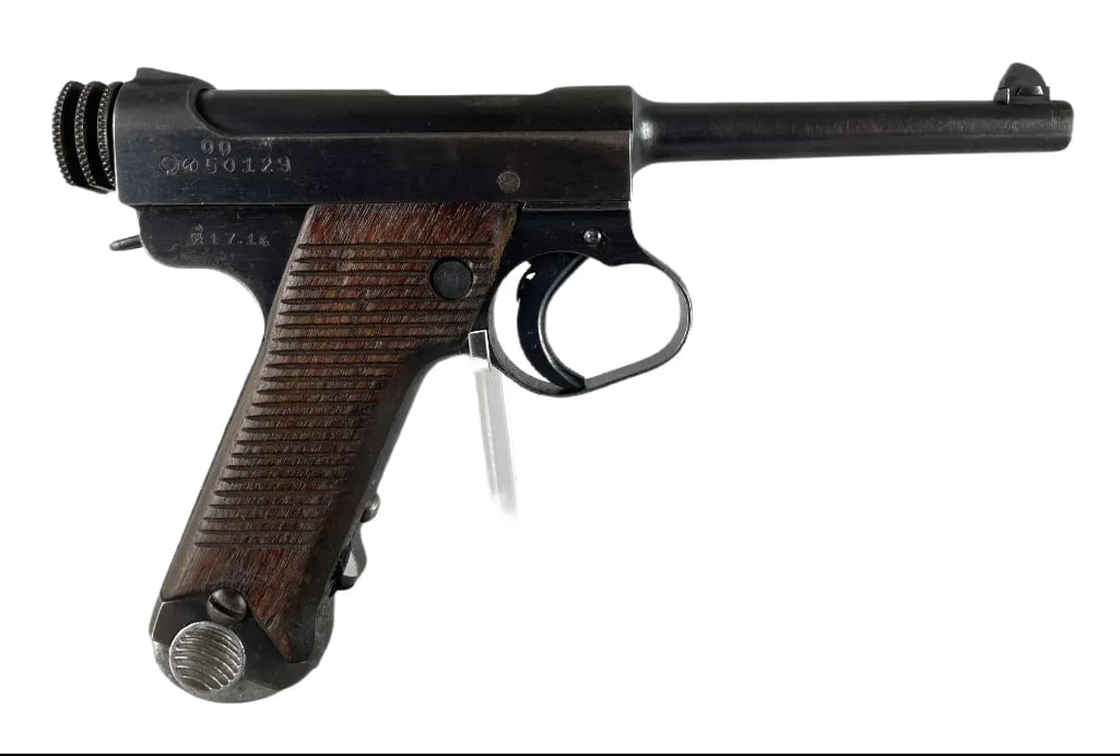 WW2 Japanese Nambu Type 14 8mm Semi-Auto Pistol: Serial # 50129. Manufactured in 1942, includes magazine