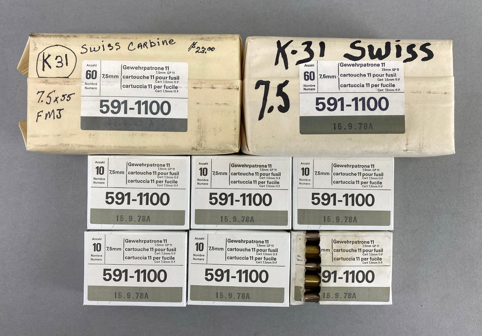Group of 180 Rounds of 7.5 mm Swiss Ammunition: Includes 2 packs of 60 per pack, 6 packs of 10 per pack, includes 1 opened pack