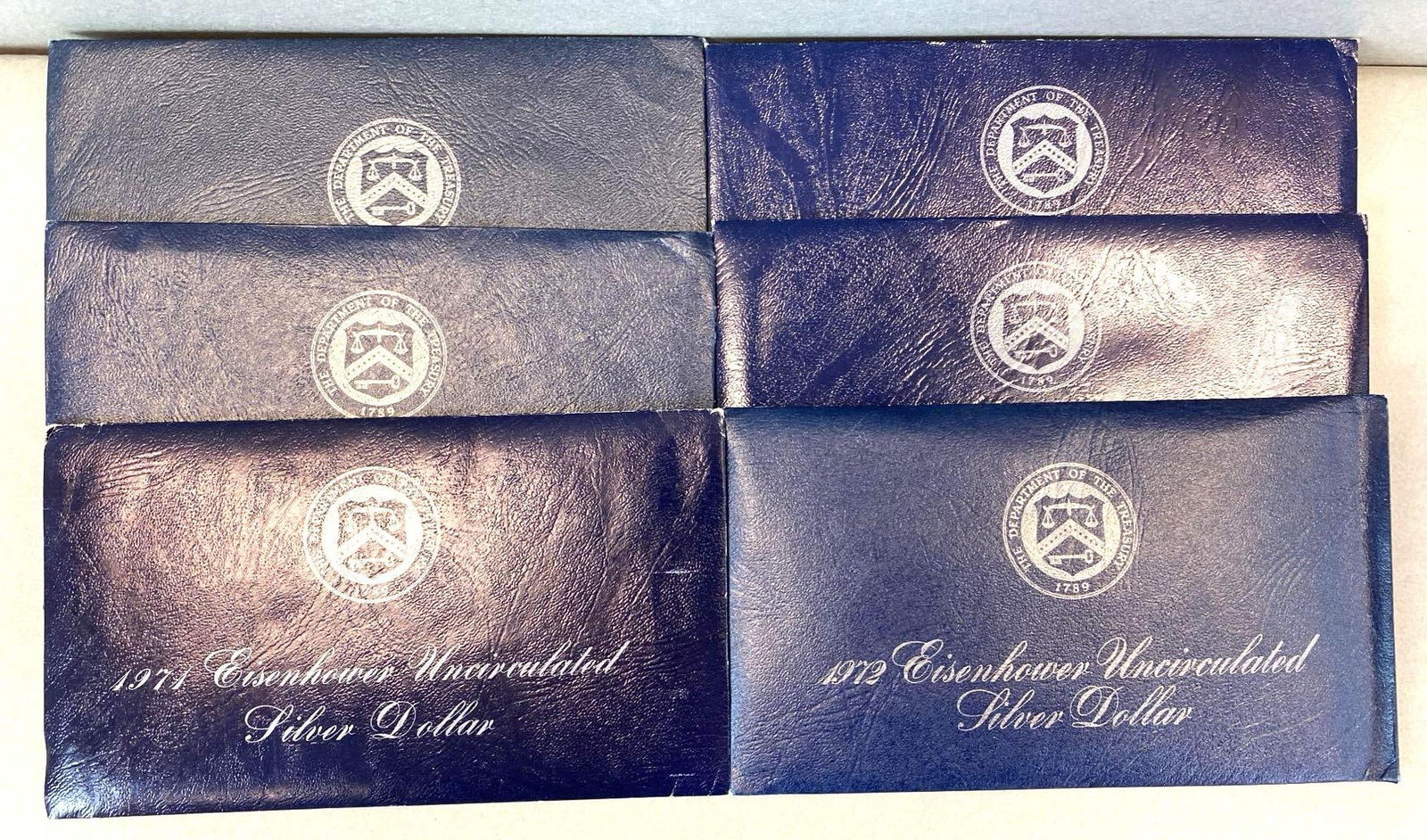 Group of 6 1974 Eisenhower Uncirculated Silver Dollars (1 of 4)