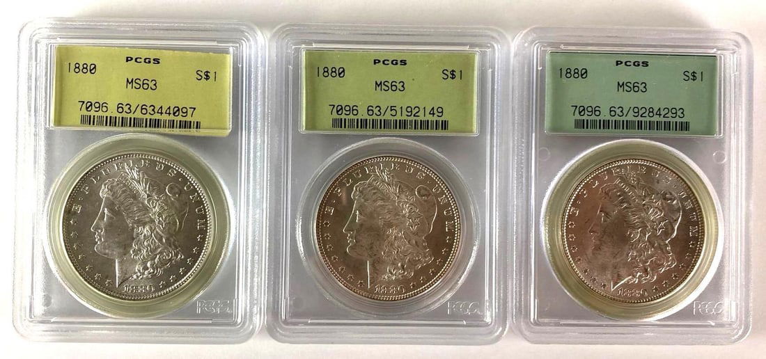 Group of (3) 1880 PCGS MS63 US Morgan Silver Dollars (1 of 2)