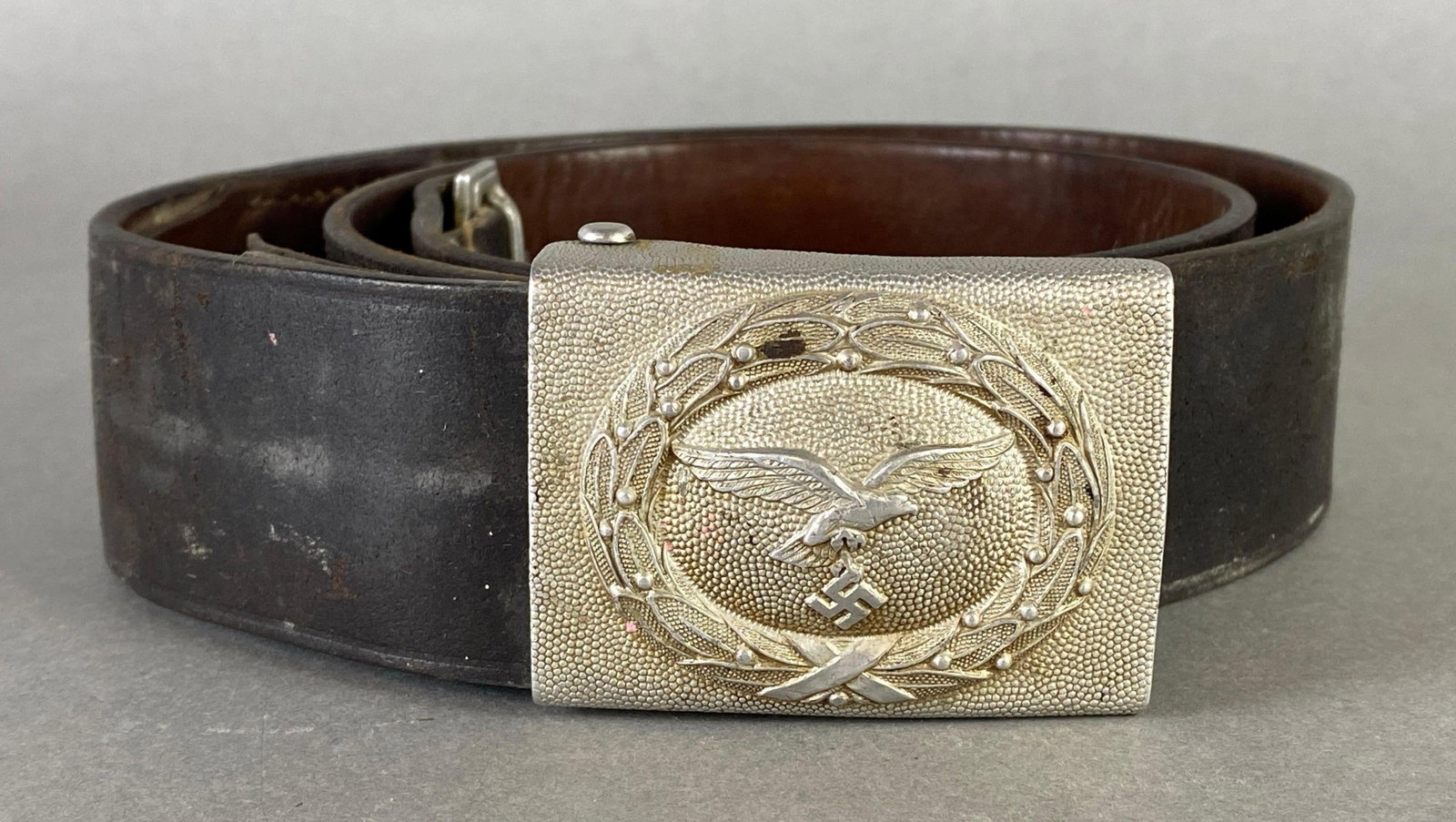WW2 German Leather Belt with Belt Buckle: Buckle measures 2 x 2 1/2 x 3/4 inches, Belt measures 38 inches long.