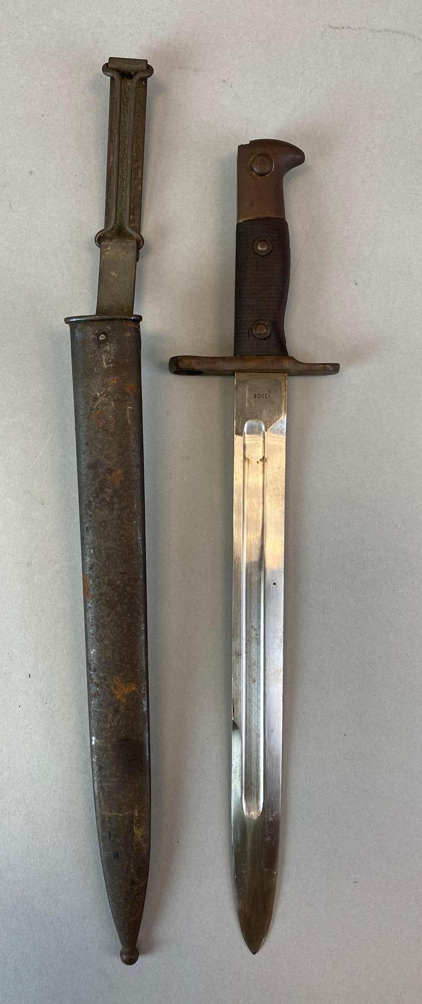 1903 US Krag Scabbard with Bayonet: Model 1892. Measures 16 1/4 inches overall with 11 5/8 inch blade. Scabbard measures 18 inches.