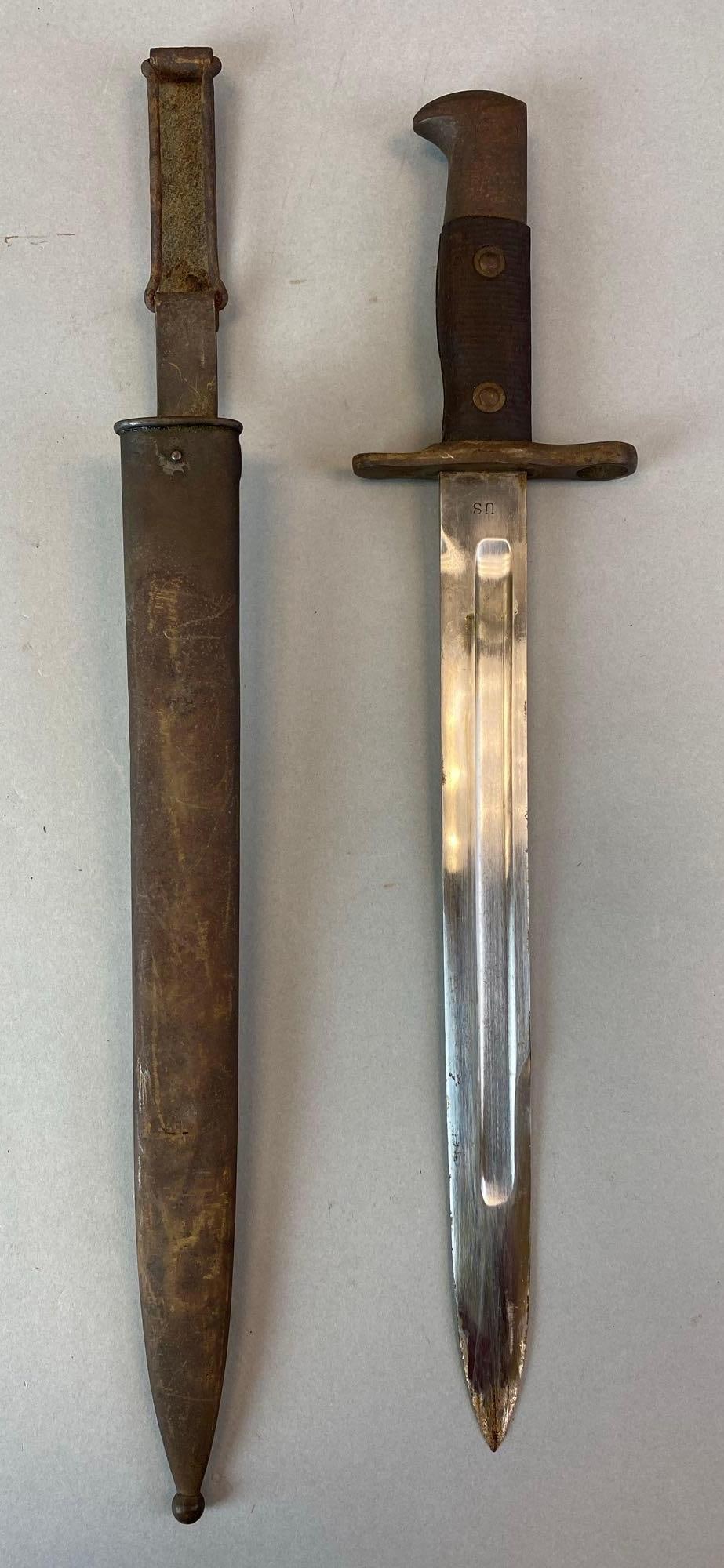 1898 US Krag Scabbard with Bayonet: Model 1892. Measures 16 1/4 inches overall with 11 5/8 inch blade. Scabbard measures 18 inches.