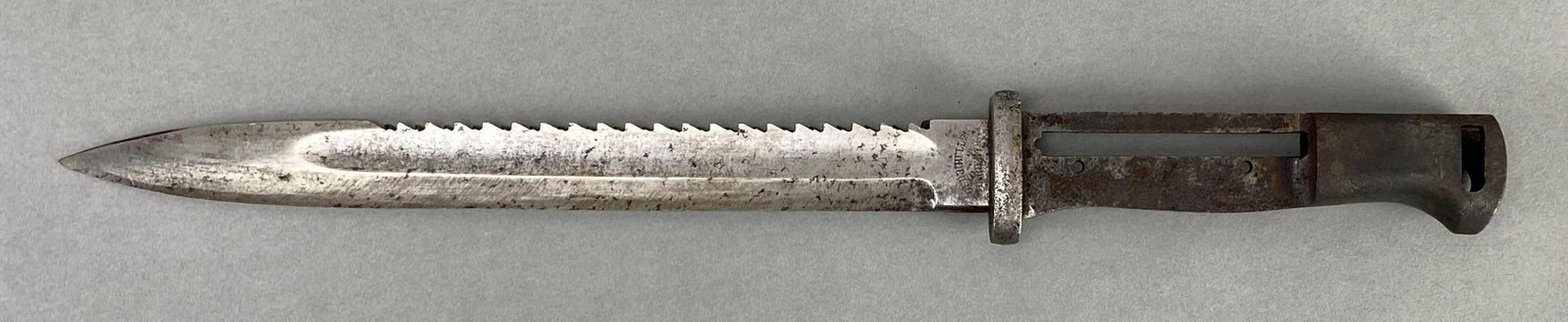 WW1 German K98 Mauser Saw Back Bayonet: missing hand guard and pins, measures 15 inches in length with a 9 1/4 inch blade