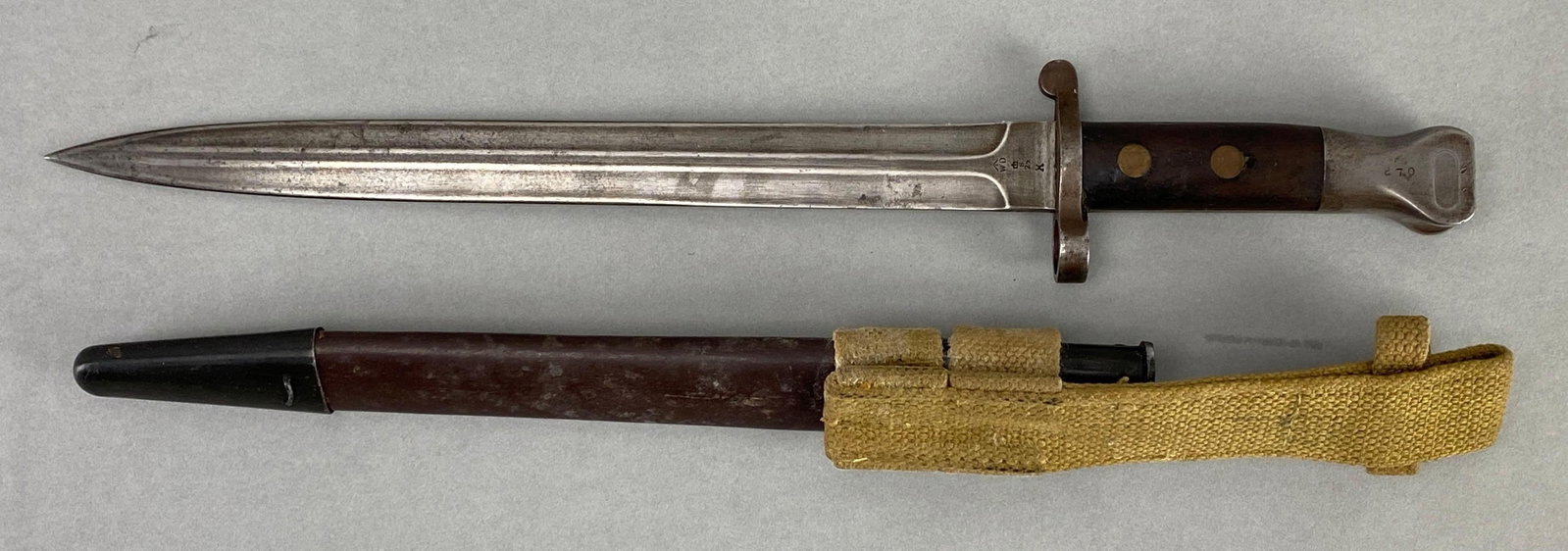 British Pattern 1888 Mk I Type II Lee Metford Rifle Bayonet With Scabbard and Frog: Measures 16 1/2 inches in length with a 11 1/4 inch blade