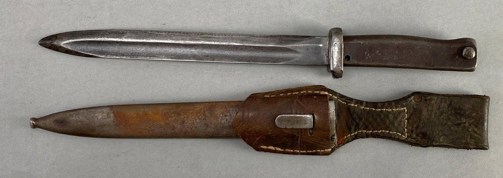 Swiss Model 1957 Bayonet with Scabbard and Frog: Measures 14 1/2 inches in length with a 9 inch blade