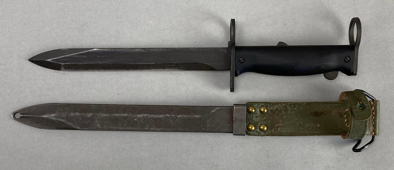French MAS 69 Famas Rifle Bayonet with Scabbard and Frog: Measures 13 inches in length with a 7 1/2 inch blade