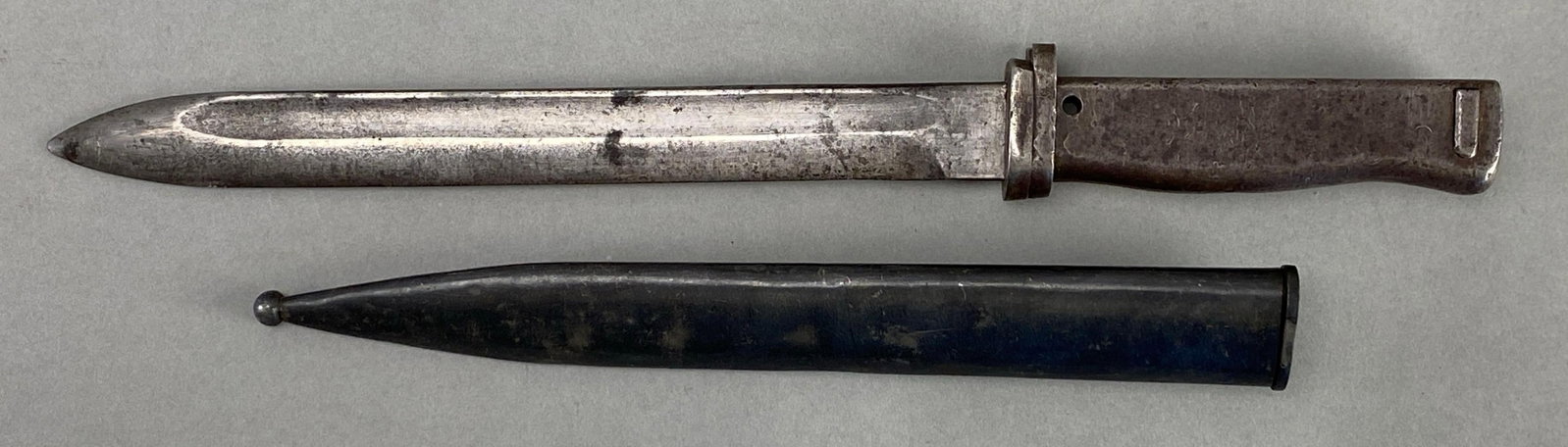 German Steel Handle Rifle Bayonet with Scabbard: Measures 15 inches in length with a 9 1/4 inch blade