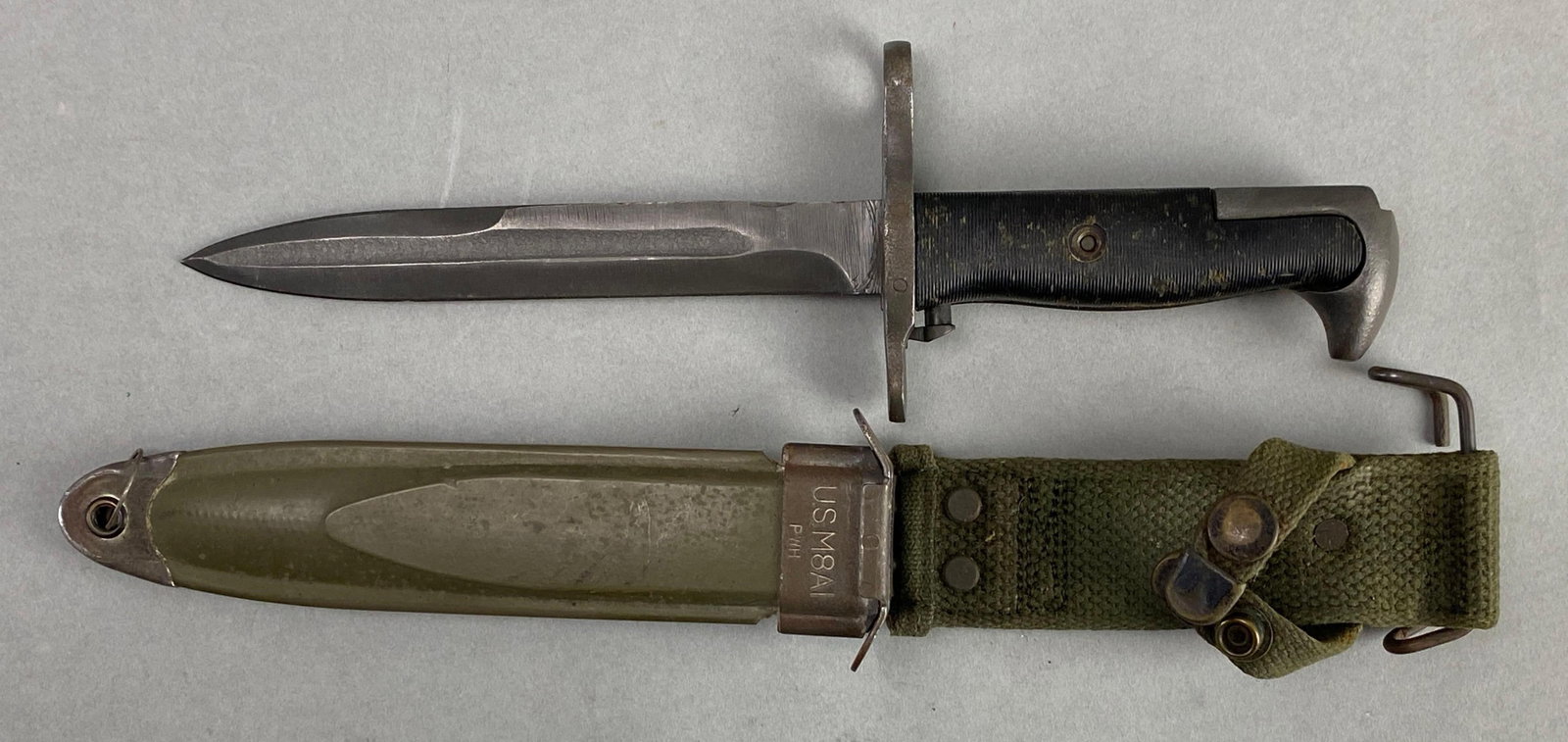 US M1 Garand Rifle Bayonet with M8A1 Scabbard with Frog: Measures 11 inches in length with a 6 inch blade