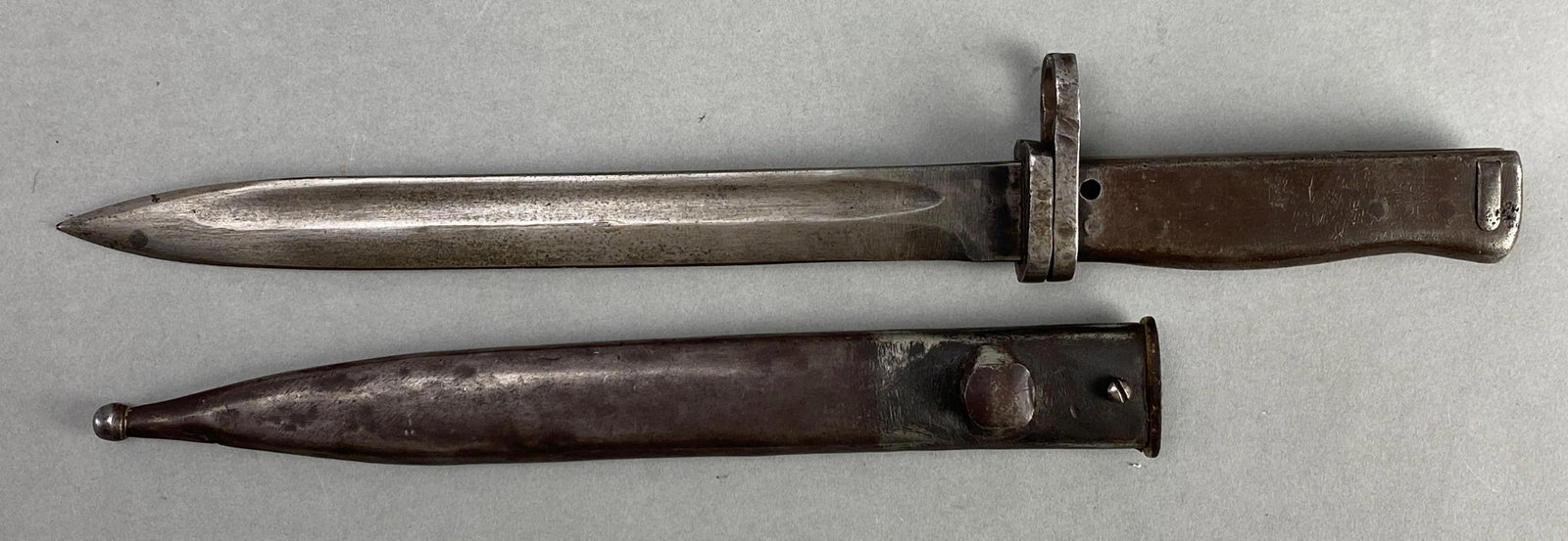 German Steel Hilt Rifle Bayonet with Scabbard: Measures 14 3/4 inches in length with a 9 inch blade