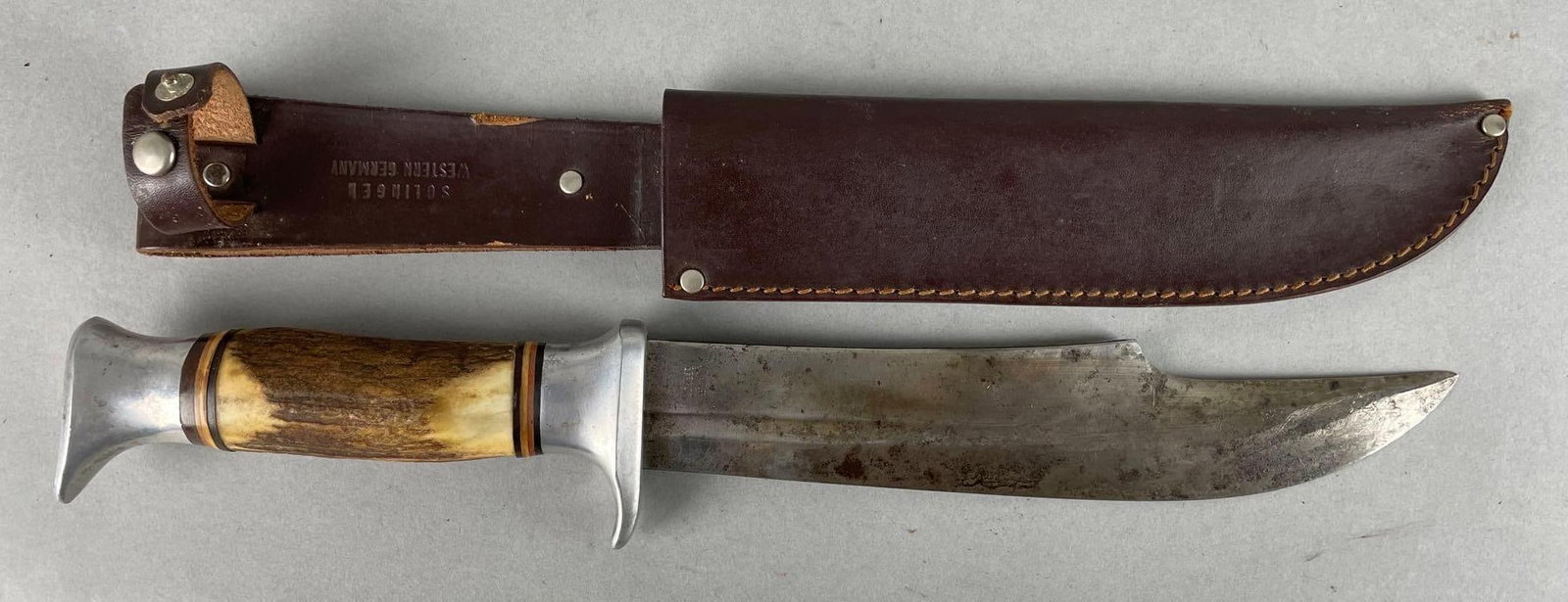 York Cutlery Co. Stag Handle Hunting Knife and Sheath: Solingen Germany, knife measures 13 1/2 inches with 8 1/4 inch blade