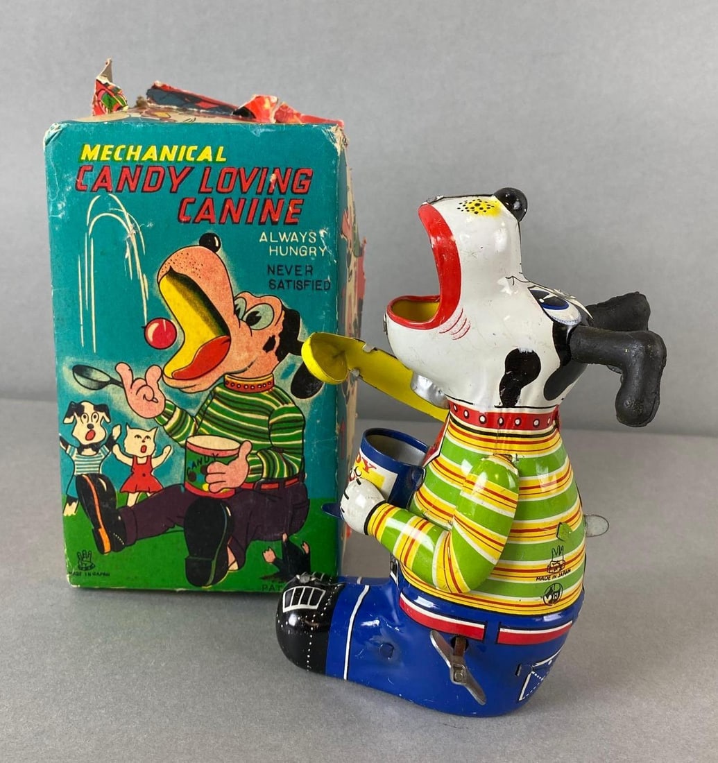 Japan Tin Litho Mechanical Wind-Up Candy Loving Canine: In working condition. Box measures 5 3/4 x 3 1/2 x 2 inches.