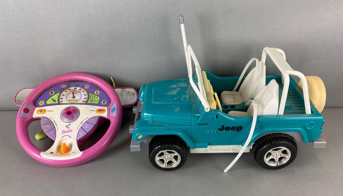 Mattel Barbie Jeep and More: Includes Barbie play steering wheel. Steering wheel is missing battery cover. Largest item measures 10 x 15 x 8 1/2 inches.