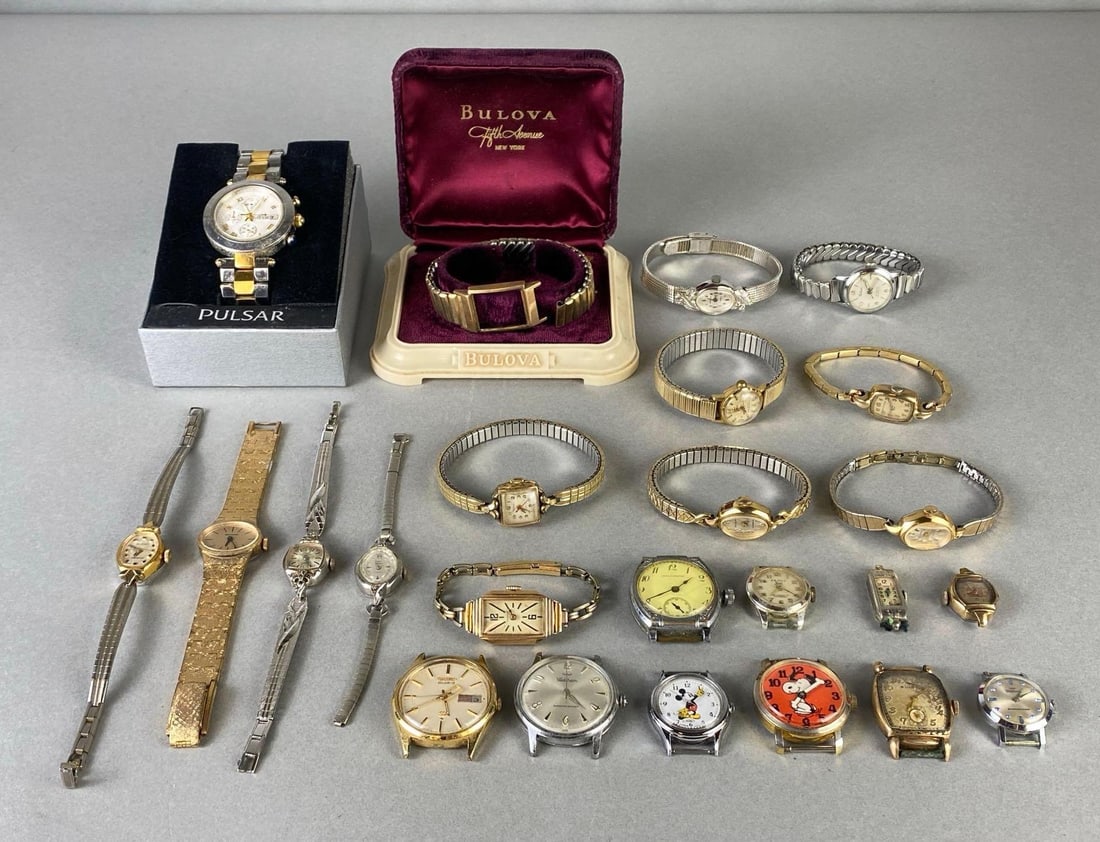 Group of Womens and Mens Wristwatches: Includes Pulsar, Waltham, Lorus Mickey Mouse, Berco, Seiko, and more, Largest measures 8 1/4 inches around.