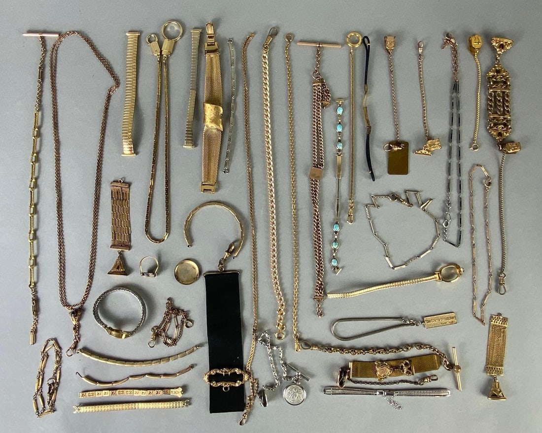 Group of Watch Fobs and More: Includes Watch fins, parts, chains, and more, Longest measures 26 inches long.