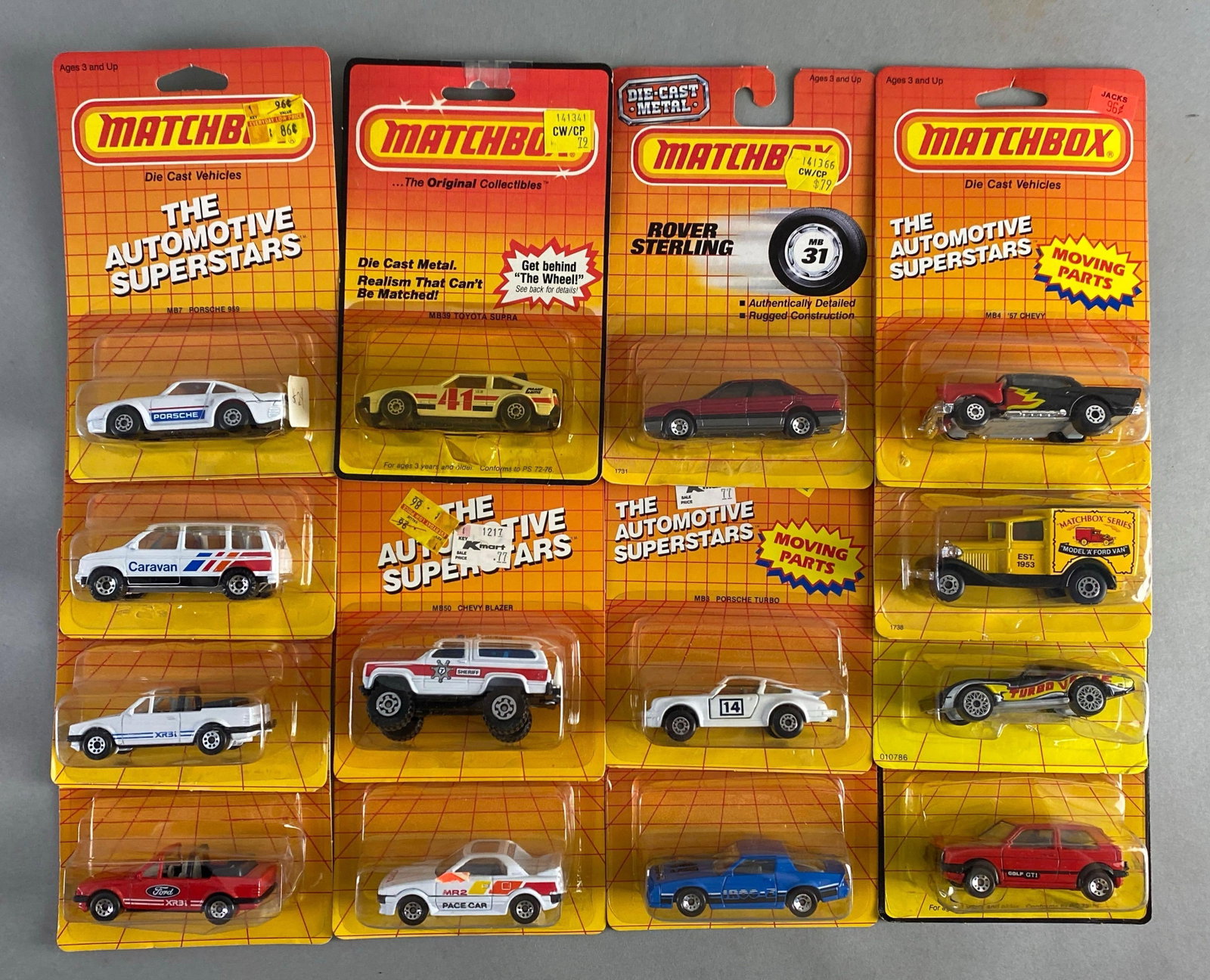Group of 14 Matchbox Die-Cast Vehciles: incluxrs m87 Porsche 969, mb39 Toyota Suprac m850 Chevy blazer and more, like new in packaging
