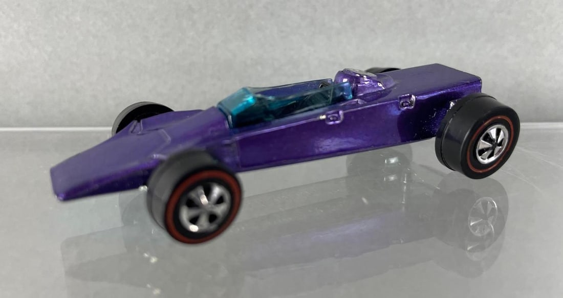 Hot Wheels Redline Lotus Turbine die-cast vehicle: 1969 Mattel, Inc. Purple Body Color. Mint Condition, Upon close inspection may exhibit extreme minor imperfections. Any flaw is barely noticeable, pin chip. Black interior, blue windshield