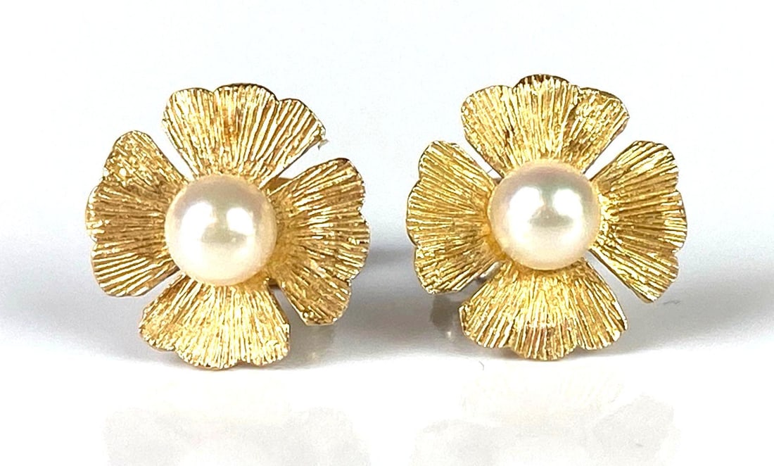 Pair of 14K Gold Pearl Floral Stud Earrings: Total weight 1.3g, Both measure 1/2 inch long.